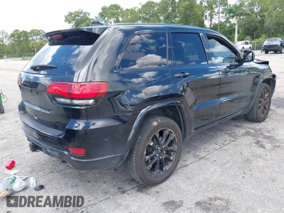 2017 Jeep Grand Cherokee Laredo with VIN 1C4RJEAG7HC953375, listed as a IAAI auction lot 42965006 with 120,951 mi miles and . Bid and sale history available at DreamBid. Image 4.