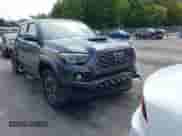 2023 Toyota Tacoma SR z VIN 3TMCZ5AN3PM613358, wystawiony jako IAAI lot #43211852 z przebiegiem 25 287 mil mil oraz . Historia ofert i sprzedaży dostępna na DreamBid. Obrazek 1.