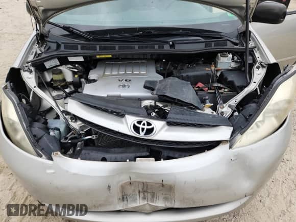 2010 Toyota Sienna CE z VIN 5TDKK4CC2AS297884, wystawiony jako Copart lot #67843815 z przebiegiem 171 954 mil mil oraz Szkoda całkowita • Salvage title. Historia ofert i sprzedaży dostępna na DreamBid. Obrazek 12.