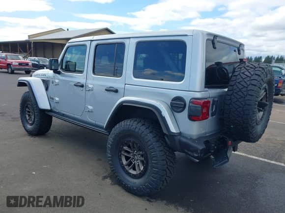 2024 Jeep Wrangler Rubicon 392 with VIN 1C4RJXSJ7RW313107, listed as a IAAI auction lot 41861304 with 635 mi miles and . Bid and sale history available at DreamBid. Image 3.