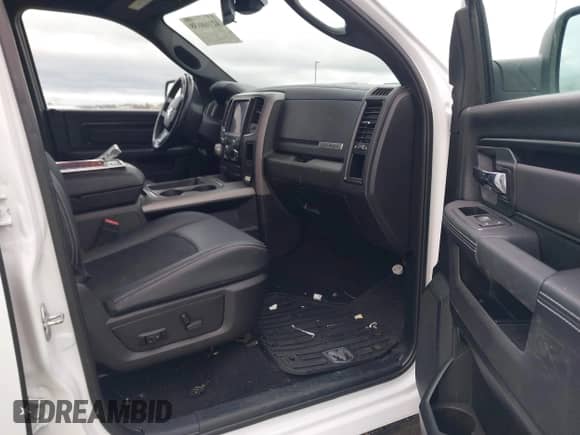 2018 Ram 1500 Rebel with VIN 1C6RR7YT8JS150942, listed as a IAAI auction lot 42168638 with 99,060 mi miles and . Bid and sale history available at DreamBid. Image 5.