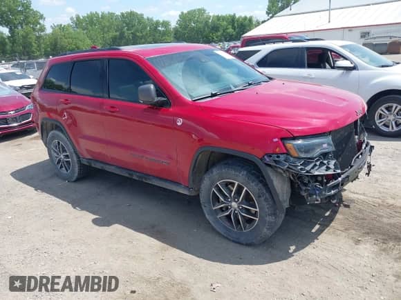 2017 Jeep Grand Cherokee Trailhawk z VIN 1C4RJFLT8HC693715, wystawiony jako IAAI lot #42531133 z przebiegiem 128 250 mil mil oraz . Historia ofert i sprzedaży dostępna na DreamBid. Obrazek 1.