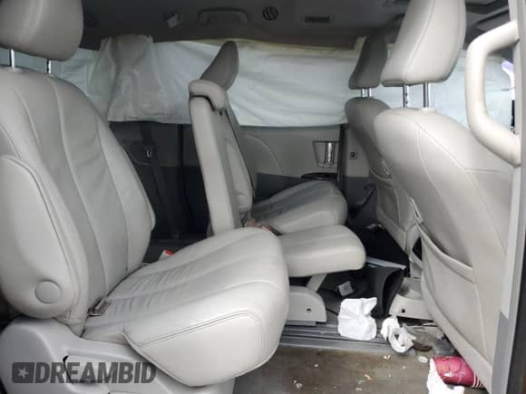 2012 Toyota Sienna XLE с VIN 5TDYK3DC3CS264575, выставлен на аукционе Copart как лот 82296885 с пробегом 131 577 миль миль и Списание • Salvage title. История ставок и продаж доступна на DreamBid. Изображение 11.