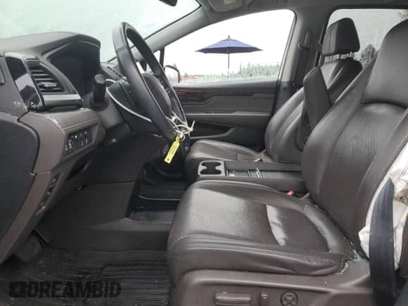 2020 Honda Odyssey Elite z VIN 5FNRL6H94LB033044, wystawiony jako Copart lot #89712385 z przebiegiem Nie podano mil oraz Szkoda całkowita • Salvage title. Historia ofert i sprzedaży dostępna na DreamBid. Obrazek 7.