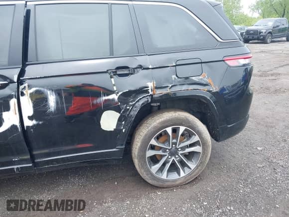 2023 Jeep Grand Cherokee Overland with VIN 1C4RJHDG2PC516797, listed as a IAAI auction lot 42026063 with 25,808 mi miles and . Bid and sale history available at DreamBid. Image 18.