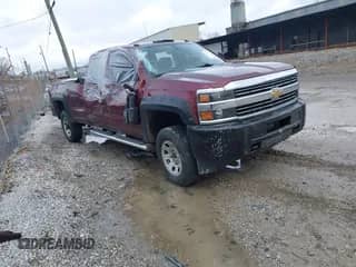 2016 Chevrolet Silverado 2500HD Work Truck z VIN 1GC1KUE85GF136801, wystawiony jako IAAI lot #41253350 z przebiegiem Nie podano mil oraz . Historia ofert i sprzedaży dostępna na DreamBid. Obrazek 1.