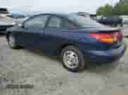 1999 Saturn SC with VIN 1G8ZY1273XZ328268, listed as a Copart auction lot 61796915 with 151,562 mi miles and Salvage title. Bid and sale history available at DreamBid. Image 2.