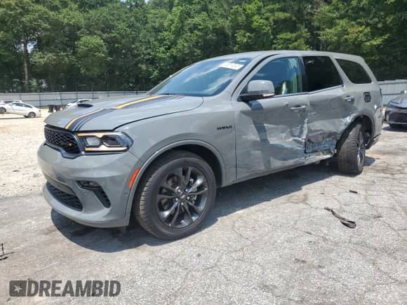 2022 Dodge Durango R/T with VIN 1C4SDJCT7NC228754, listed as a Copart auction lot 63614545 with 61,143 mi miles and Salvage title. Bid and sale history available at DreamBid. Image 1.