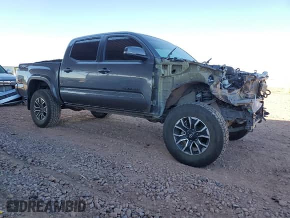 2020 Toyota Tacoma TRD Off Road с VIN 5TFCZ5AN0LX220213, выставлен на аукционе Copart как лот 82211705 с пробегом 72 977 миль миль и Списание • Salvage title. История ставок и продаж доступна на DreamBid. Изображение 4.
