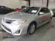 2013 Toyota Camry LE z VIN 4T1BD1FK8DU064728, wystawiony jako IAAI lot #42398146 z przebiegiem 100 867 mil mil oraz . Historia ofert i sprzedaży dostępna na DreamBid. Obrazek 19.