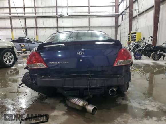2006 Hyundai Tiburon GS с VIN KMHHM65D66U230533, выставлен на аукционе Copart как лот 87877565 с пробегом 155 039 миль миль и На запчасти • Non repairable. История ставок и продаж доступна на DreamBid. Изображение 6.