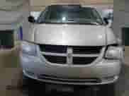 2007 Dodge Caravan SXT z VIN 1D4GP45R47B161106, wystawiony jako Copart lot #69018935 z przebiegiem 279 781 mil mil oraz Szkoda całkowita • Salvage title. Historia ofert i sprzedaży dostępna na DreamBid. Obrazek 5.