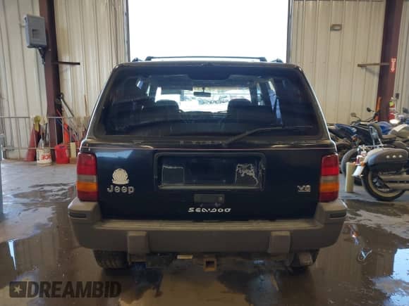 1995 Jeep Grand Cherokee Laredo with VIN 1J4GZ58Y3SC670696, listed as a IAAI auction lot 42530934 with 165,658 mi miles and . Bid and sale history available at DreamBid. Image 16.