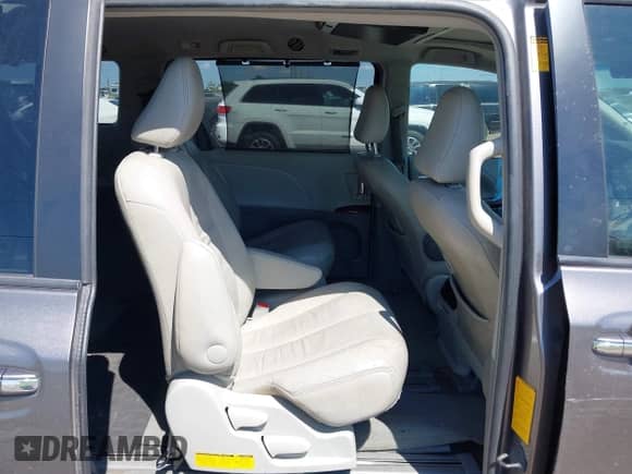 2014 Toyota Sienna XLE with VIN 5TDYK3DC8ES430088, listed as a IAAI auction lot 43006130 with 171,511 mi miles and . Bid and sale history available at DreamBid. Image 8.