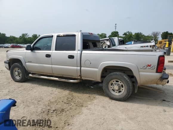 2004 Chevrolet Silverado 2500 LT с VIN 1GCGK23U34F162128, выставлен на аукционе Copart как лот 58521865 с пробегом 196 883 миль миль и Списание • Salvage title. История ставок и продаж доступна на DreamBid. Изображение 2.