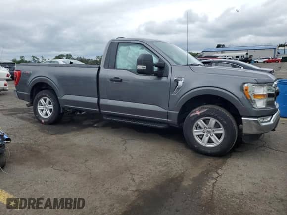 2021 Ford F-150 XL with VIN 1FTMF1E57MKD42212, listed as a Copart auction lot 61053984 with Not provided miles and Salvage title. Bid and sale history available at DreamBid. Image 4.
