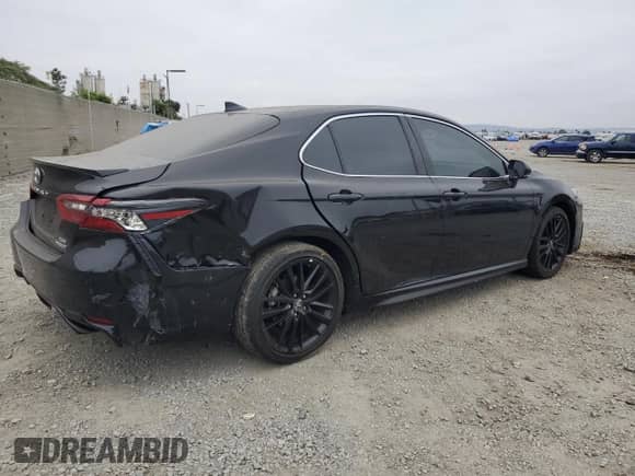 2023 Toyota Camry Hybrid XSE с VIN 4T1K31AK3PU056261, выставлен на аукционе Copart как лот 67843095 с пробегом 20 789 миль миль и Списание • Salvage title. История ставок и продаж доступна на DreamBid. Изображение 3.