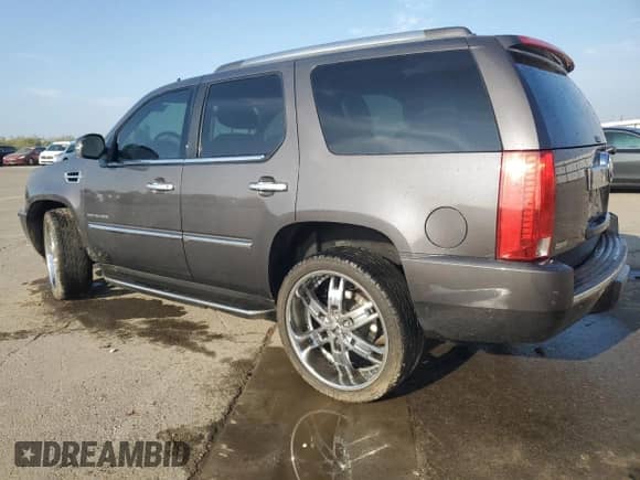 2011 Cadillac Escalade with VIN 1GYS3AEF4BR161964, listed as a Copart auction lot 83394334 with 147,525 mi miles and Salvage title. Bid and sale history available at DreamBid. Image 2.