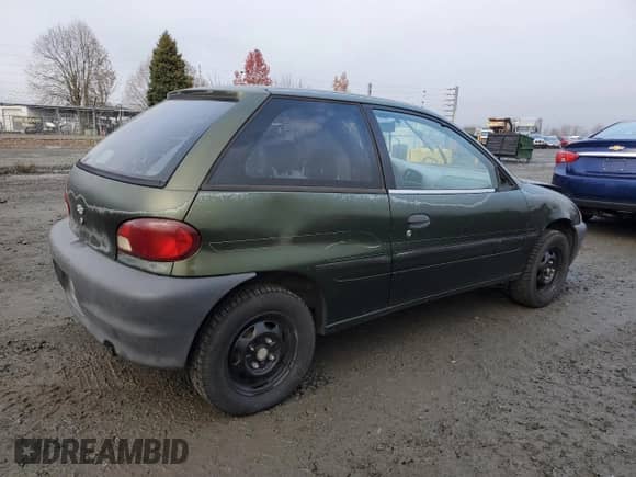 1999 Chevrolet Metro с VIN 2C1MR2268X6701369, выставлен на аукционе Copart как лот 84494354 с пробегом 156 275 миль миль и Списание • Salvage title. История ставок и продаж доступна на DreamBid. Изображение 3.