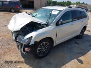 2018 Dodge Journey SE with VIN 3C4PDCABXJT448934, listed as a IAAI auction lot 42614601 with Not provided miles and . Bid and sale history available at DreamBid. Image 2.