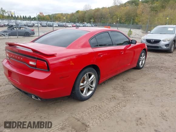 2013 Dodge Charger SXT с VIN 2C3CDXJG5DH541184, выставлен на аукционе IAAI как лот 43513116 с пробегом 202 634 миль миль и . История ставок и продаж доступна на DreamBid. Изображение 4.