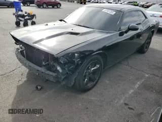 2013 Dodge Challenger SXT с VIN 2C3CDYAG0DH729147, выставлен на аукционе Copart как лот 67481355 с пробегом 110 937 миль миль и Списание • Salvage title. История ставок и продаж доступна на DreamBid. Изображение 1.