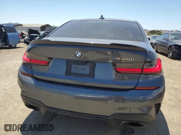 2020 BMW 3 Series M340i z VIN 3MW5U7J02L8B32282, wystawiony jako Copart lot #63470085 z przebiegiem 58 771 mil mil oraz Szkoda całkowita • Salvage title. Historia ofert i sprzedaży dostępna na DreamBid. Obrazek 6.