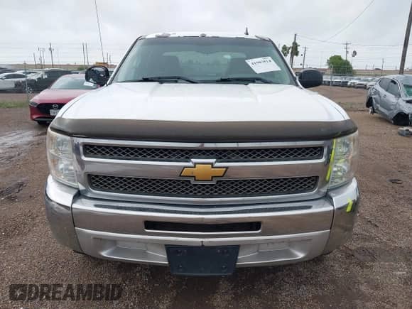 2012 Chevrolet Silverado 1500 LS z VIN 3GCPCREAXCG128550, wystawiony jako IAAI lot #41903814 z przebiegiem 248 558 mil mil oraz . Historia ofert i sprzedaży dostępna na DreamBid. Obrazek 12.