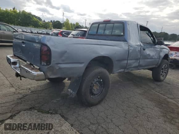 1998 Toyota Tacoma z VIN 4TAWN72N2WZ121495, wystawiony jako Copart lot #85473395 z przebiegiem 241 732 mil mil oraz Szkoda całkowita • Salvage title. Historia ofert i sprzedaży dostępna na DreamBid. Obrazek 3.
