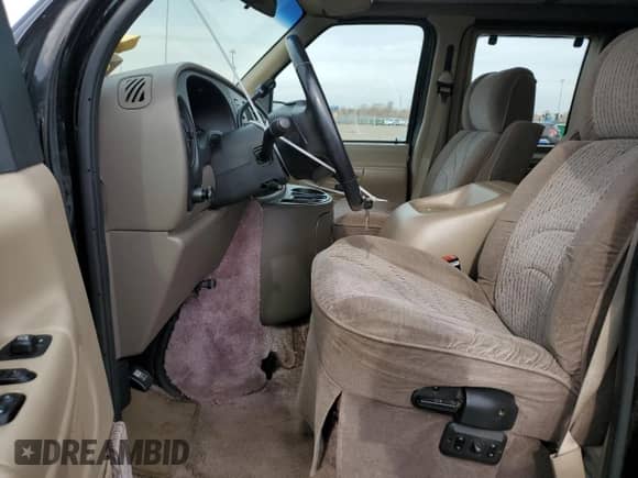 1999 Ford Econoline Cargo with VIN 1FDRE14W6XHA56562, listed as a Copart auction lot 75185804 with 153,673 mi miles and Clean title. Bid and sale history available at DreamBid. Image 7.