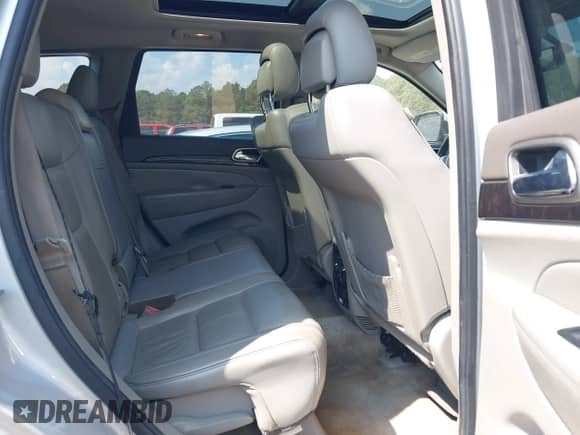 2012 Jeep Grand Cherokee Laredo z VIN 1C4RJEAG9CC151340, wystawiony jako IAAI lot #43249143 z przebiegiem 208 847 mil mil oraz . Historia ofert i sprzedaży dostępna na DreamBid. Obrazek 8.