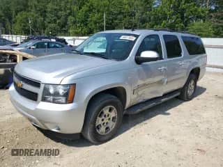 2013 Chevrolet Suburban LS с VIN 1GNSKHE79DR275043, выставлен на аукционе Copart как лот 66611695 с пробегом 134 062 миль миль и Списание • Salvage title. История ставок и продаж доступна на DreamBid. Изображение 1.