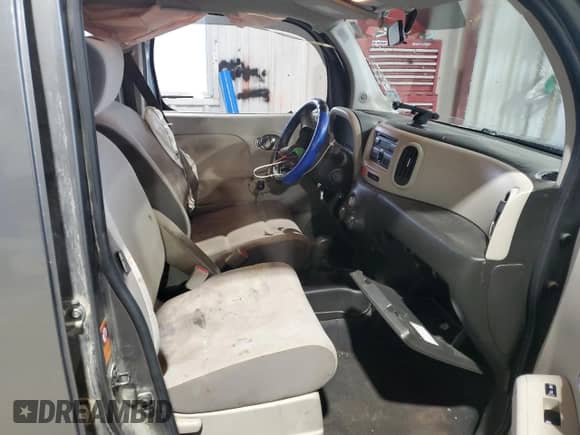 2009 Nissan Cube SL с VIN JN8AZ28R19T112749, выставлен на аукционе Copart как лот 56135965 с пробегом 122 579 миль миль и Списание • Salvage title. История ставок и продаж доступна на DreamBid. Изображение 7.