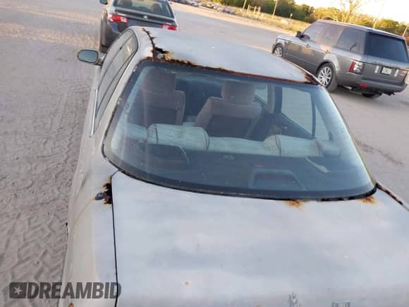 1991 Honda Accord LX z VIN JHMCB7651MC015726, wystawiony jako IAAI lot #41843620 z przebiegiem 55 563 mil mil oraz . Historia ofert i sprzedaży dostępna na DreamBid. Obrazek 14.