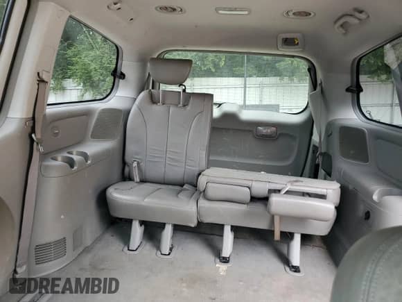 2007 Hyundai Entourage GLS with VIN KNDMC233376023404, listed as a Copart auction lot 69413625 with 135,989 mi miles and Salvage title. Bid and sale history available at DreamBid. Image 10.