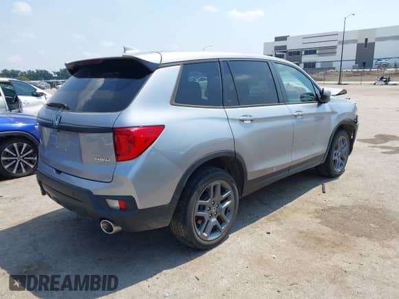2022 Honda Passport EX-L with VIN 5FNYF8H56NB030824, listed as a IAAI auction lot 43089301 with 16,999 mi miles and . Bid and sale history available at DreamBid. Image 4.