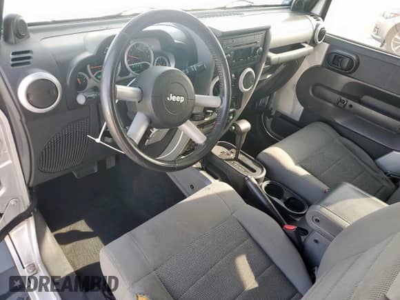 2009 Jeep Wrangler Sahara с VIN 1J4FA54169L780809, выставлен на аукционе Copart как лот 50598925 с пробегом 121 078 миль миль и Списание • Salvage title. История ставок и продаж доступна на DreamBid. Изображение 10.