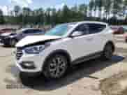 2017 Hyundai Santa Fe Ultimate с VIN 5NMZW4LA8HH046284, выставлен на аукционе Copart как лот 70824075 с пробегом Не указан миль и Списание • Salvage title. История ставок и продаж доступна на DreamBid. Изображение 1.