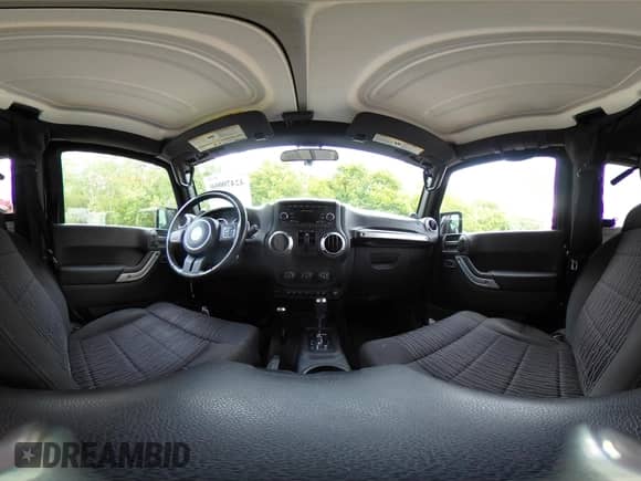 2012 Jeep Wrangler Arctic with VIN 1C4AJWBG5CL154415, listed as a IAAI auction lot 42470060 with 126,553 mi miles and . Bid and sale history available at DreamBid. Image 18.