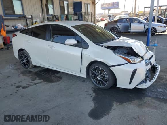 2019 Toyota Prius L Eco с VIN JTDKARFUXK3101195, выставлен на аукционе Copart как лот 82488755 с пробегом 37 486 миль миль и Списание • Salvage title. История ставок и продаж доступна на DreamBid. Изображение 4.