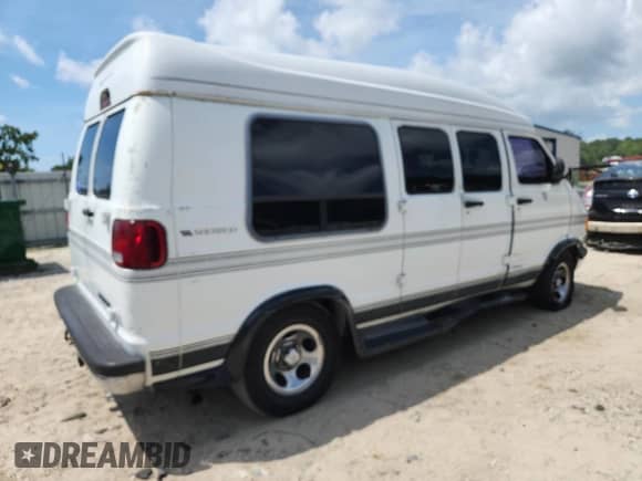 2003 Dodge RAM with VIN 2D6WB11Y13K507940, listed as a Copart auction lot 66202915 with 144,183 mi miles and Salvage title. Bid and sale history available at DreamBid. Image 3.