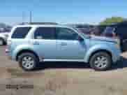 2008 Mercury Mariner with VIN 4M2CU91198KJ24730, listed as a IAAI auction lot 43341107 with 158,521 mi miles and . Bid and sale history available at DreamBid. Image 13.