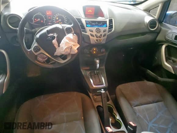 2011 Ford Fiesta SES with VIN 3FADP4FJ7BM129640, listed as a Copart auction lot 64300315 with 69,431 mi miles and Salvage title. Bid and sale history available at DreamBid. Image 8.