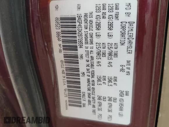 2002 Dodge Caravan Sport z VIN 1B4GP453X2B728594, wystawiony jako Copart lot #54185575 z przebiegiem 173 827 mil mil oraz Szkoda całkowita • Salvage title. Historia ofert i sprzedaży dostępna na DreamBid. Obrazek 13.
