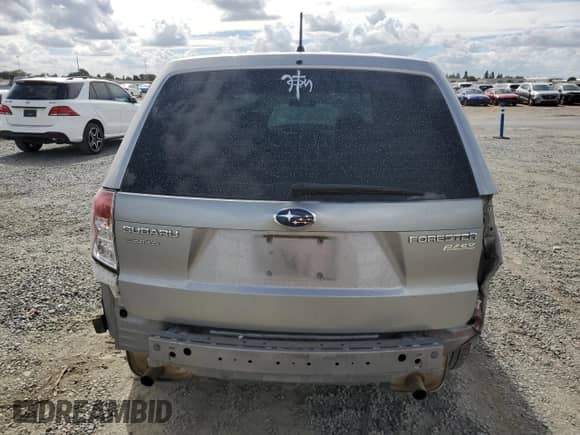 2010 Subaru Forester X с VIN JF2SH6AC3AH761428, выставлен на аукционе Copart как лот 82136755 с пробегом 126 817 миль миль и Списание • Salvage title. История ставок и продаж доступна на DreamBid. Изображение 6.