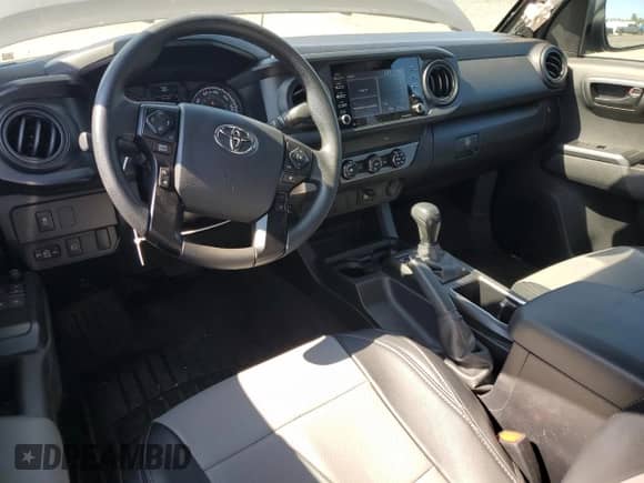 2023 Toyota Tacoma SR z VIN 3TYRX5GN9PT087510, wystawiony jako Copart lot #71041585 z przebiegiem 13 094 mil mil oraz Szkoda całkowita • Salvage title. Historia ofert i sprzedaży dostępna na DreamBid. Obrazek 8.
