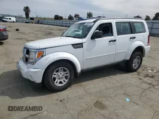 2011 Dodge Nitro SE with VIN 1D4PT2GK5BW590207, listed as a Copart auction lot 49906145 with 136,086 mi miles and Salvage title. Bid and sale history available at DreamBid. Image 1.