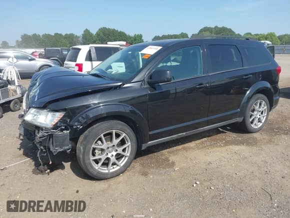 2013 Dodge Journey R/T z VIN 3C4PDCEG3DT565653, wystawiony jako IAAI lot #42801958 z przebiegiem 172 504 mil mil oraz . Historia ofert i sprzedaży dostępna na DreamBid. Obrazek 2.