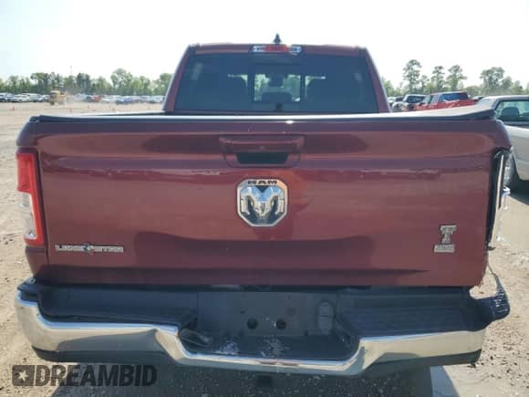 2021 Ram 1500 Big Horn z VIN 1C6RREFG1MN593219, wystawiony jako Copart lot #56027765 z przebiegiem 81 616 mil mil oraz Szkoda całkowita • Salvage title. Historia ofert i sprzedaży dostępna na DreamBid. Obrazek 6.