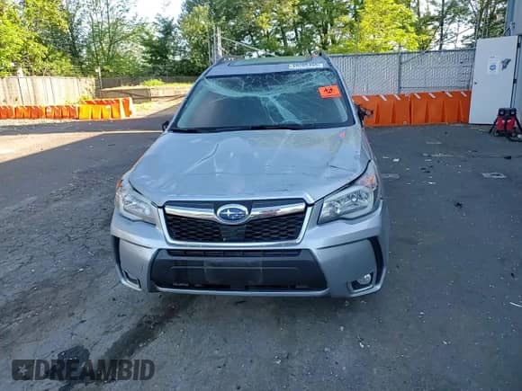 2015 Subaru Forester XT Touring with VIN JF2SJGUC1FH593818, listed as a Copart auction lot 59205455 with 56,610 mi miles and Salvage title. Bid and sale history available at DreamBid. Image 14.